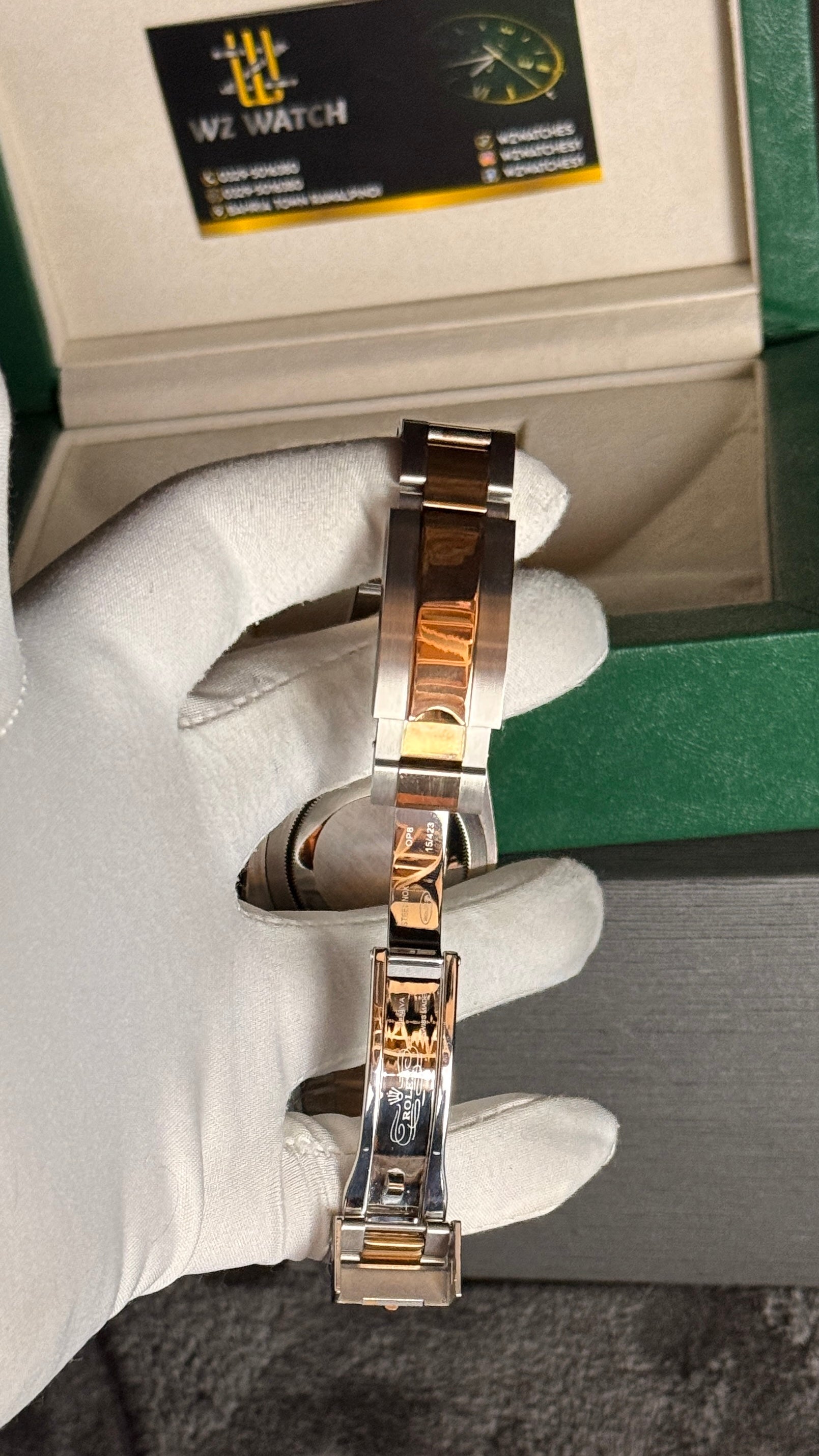Rose gold two tone with  black Dial.
