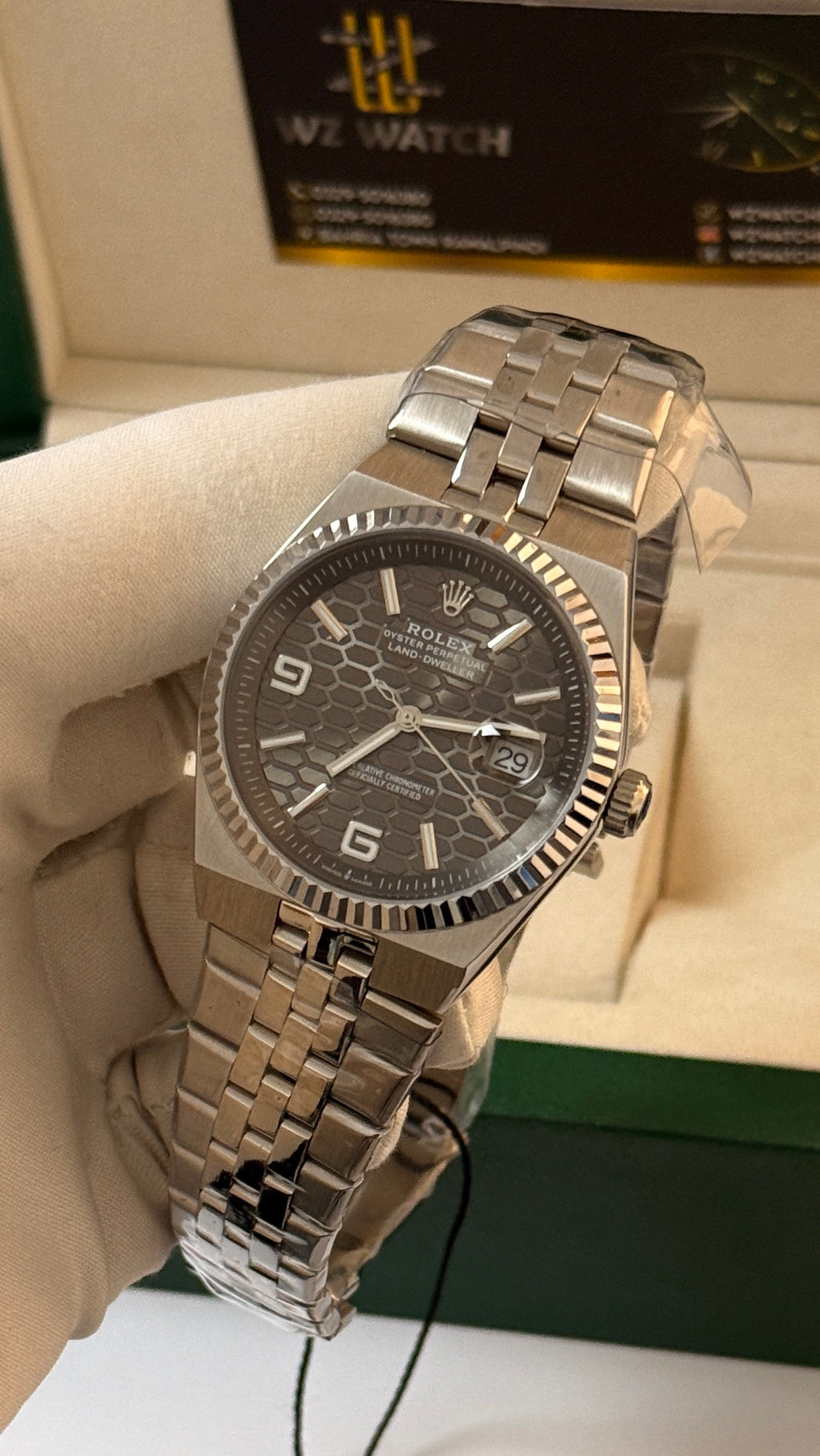 Silver with grey Dial.