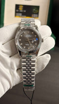 Silver with grey Dial.