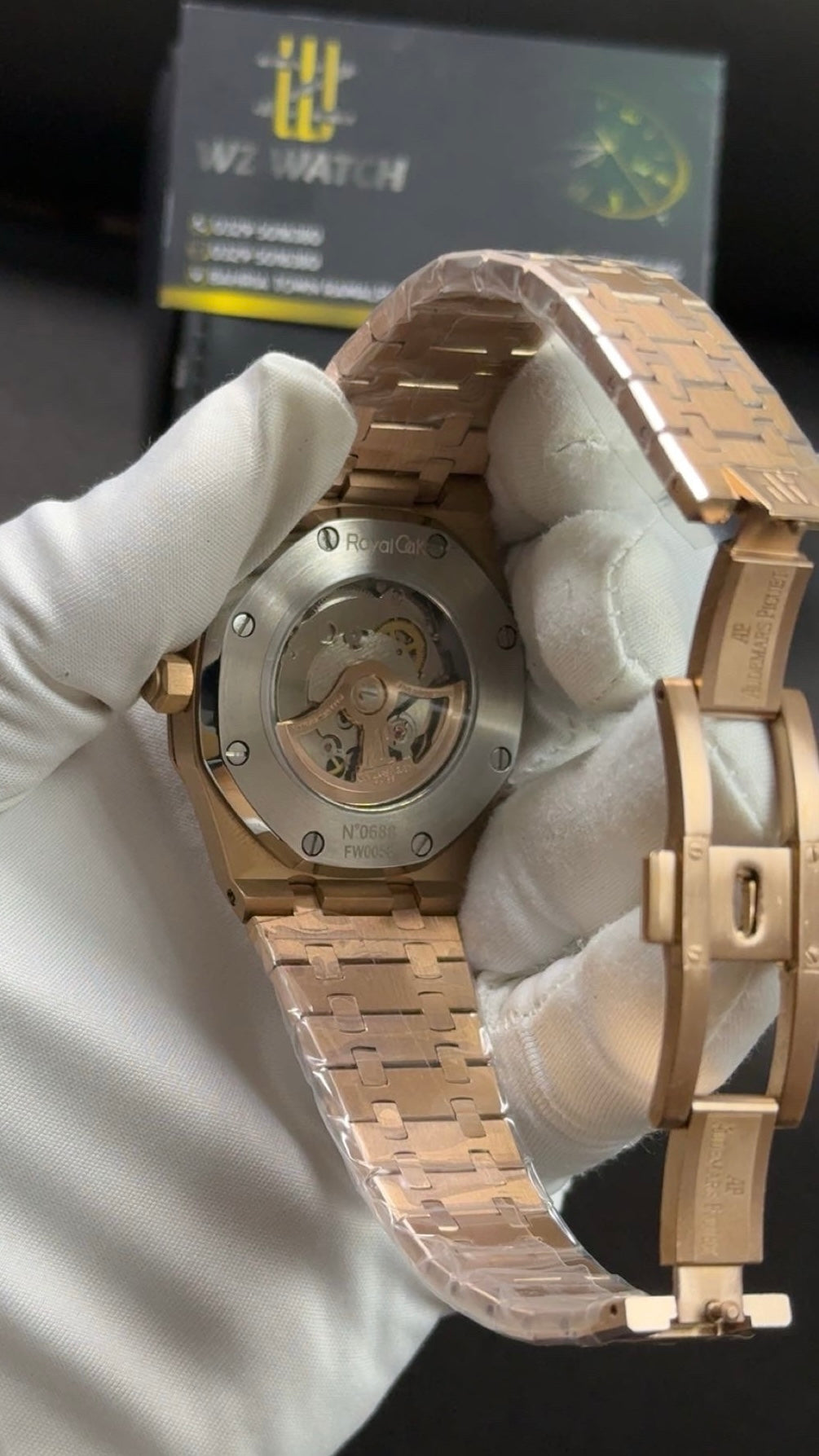 Rose gold with black dial