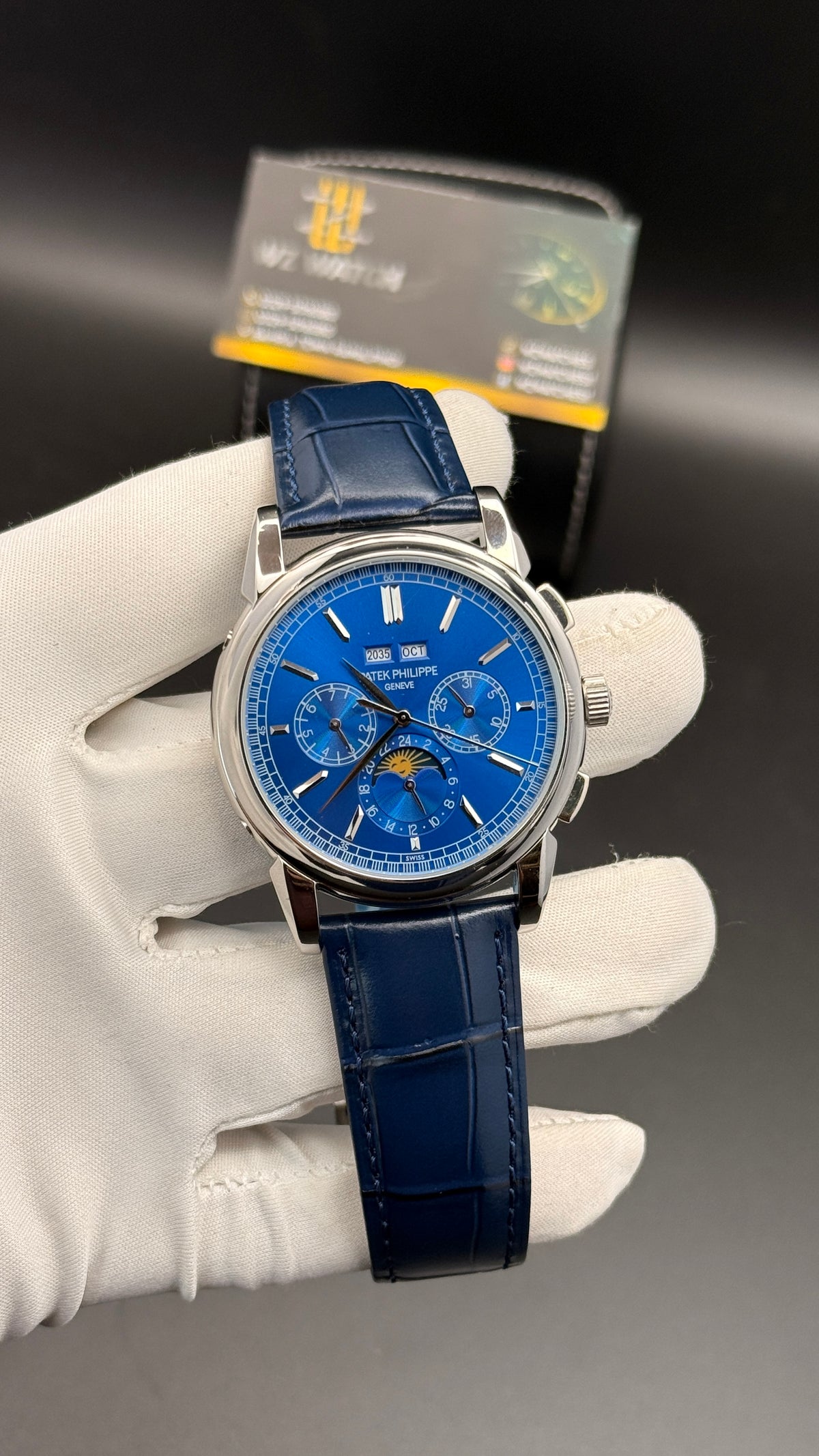 Silver with blue Dial.