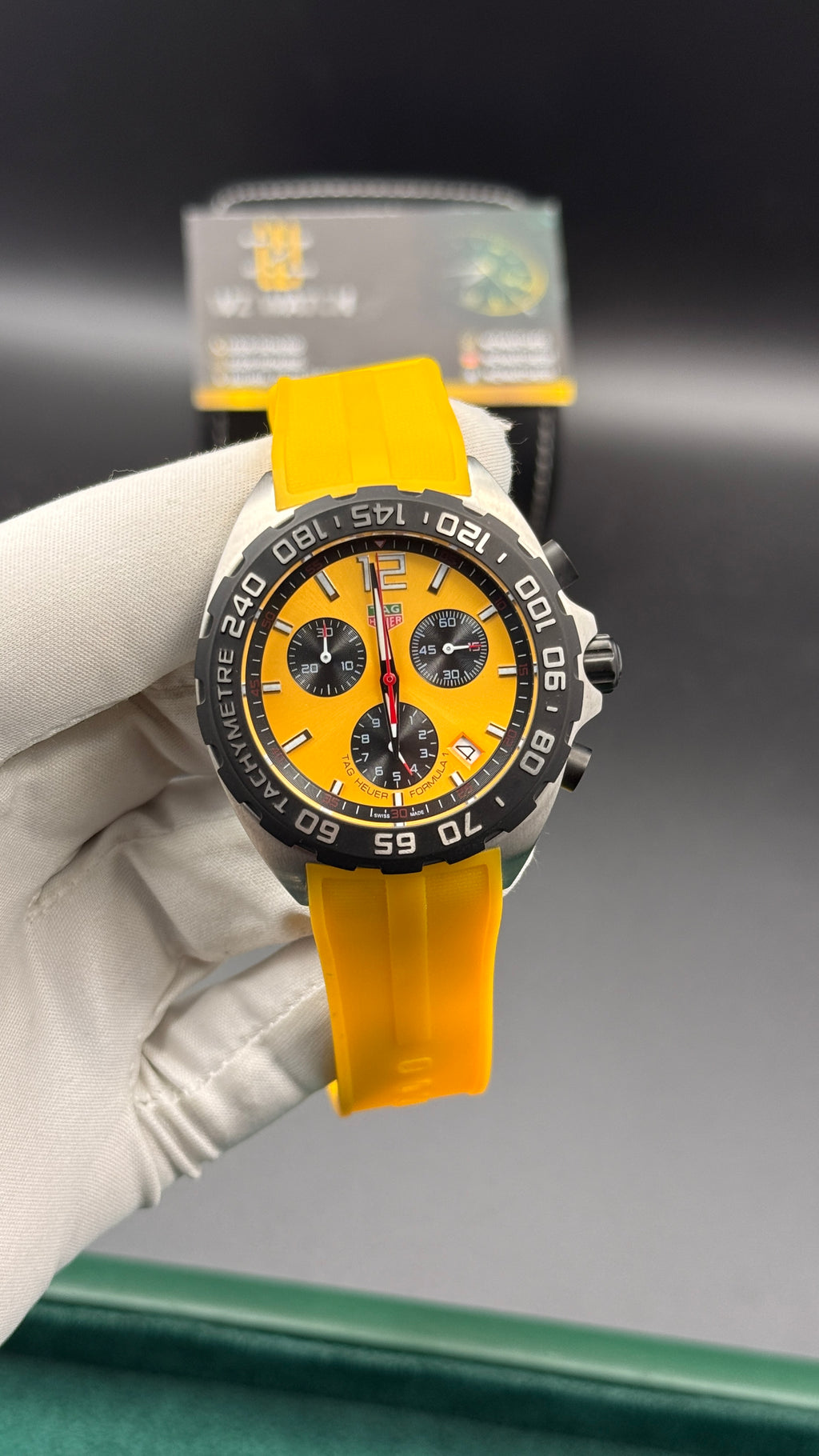 Silver with yellow Dial.