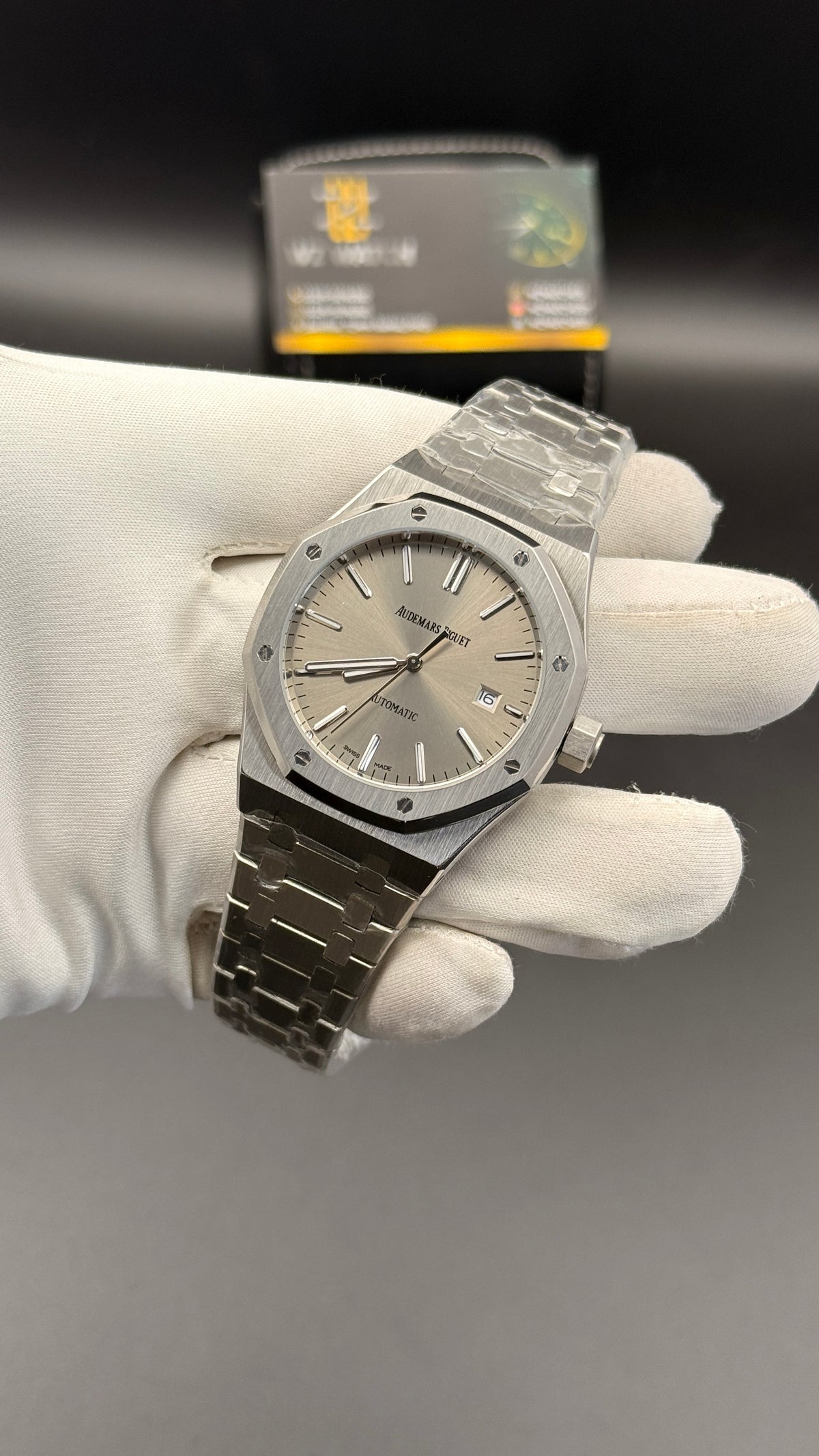 Silver with grey Dial.