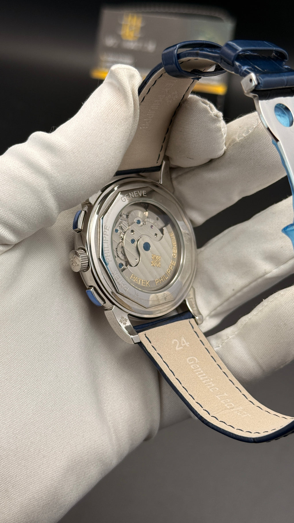 Silver with blue Dial.