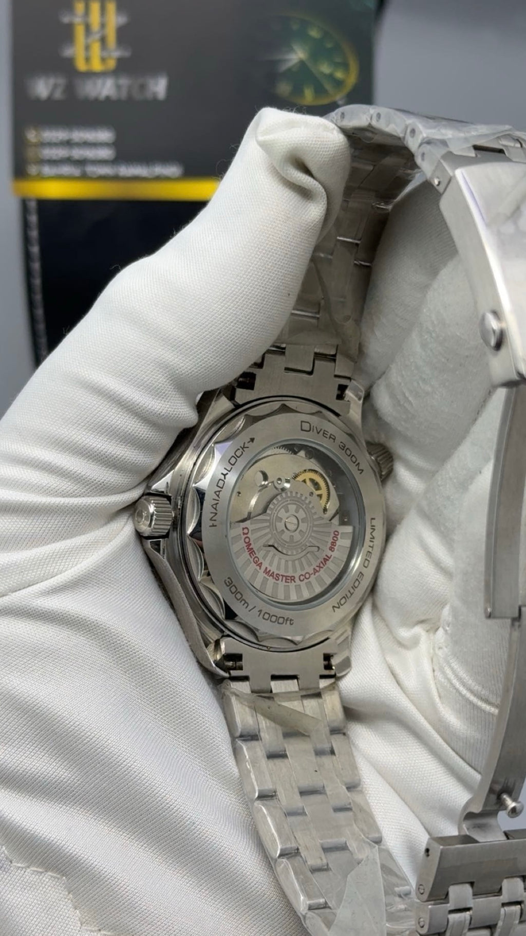 Silver with green Dial.
