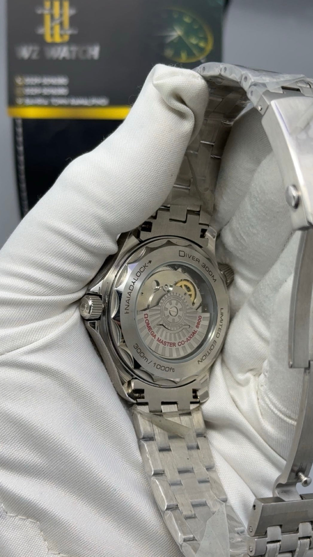 Silver with green Dial.