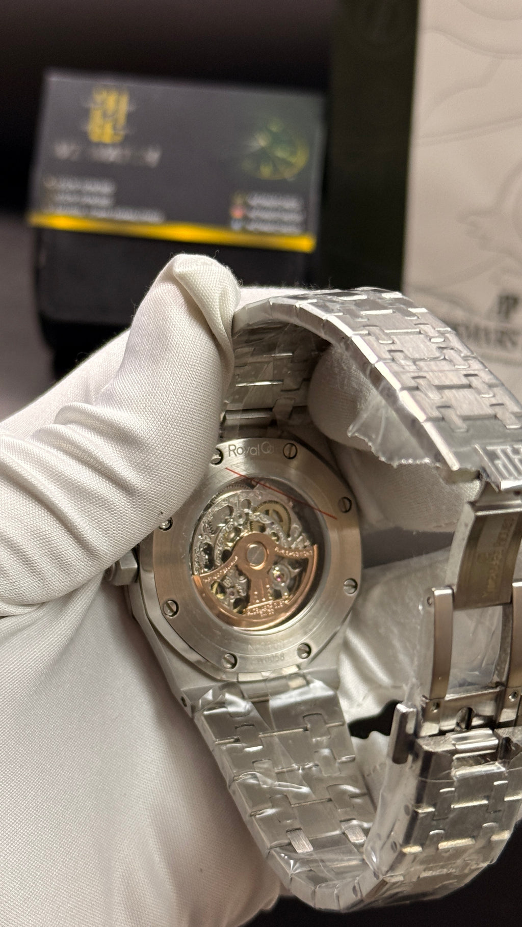 Silver with black skeleton dial