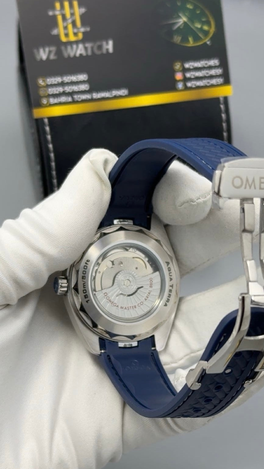 Silver with blue Dial.