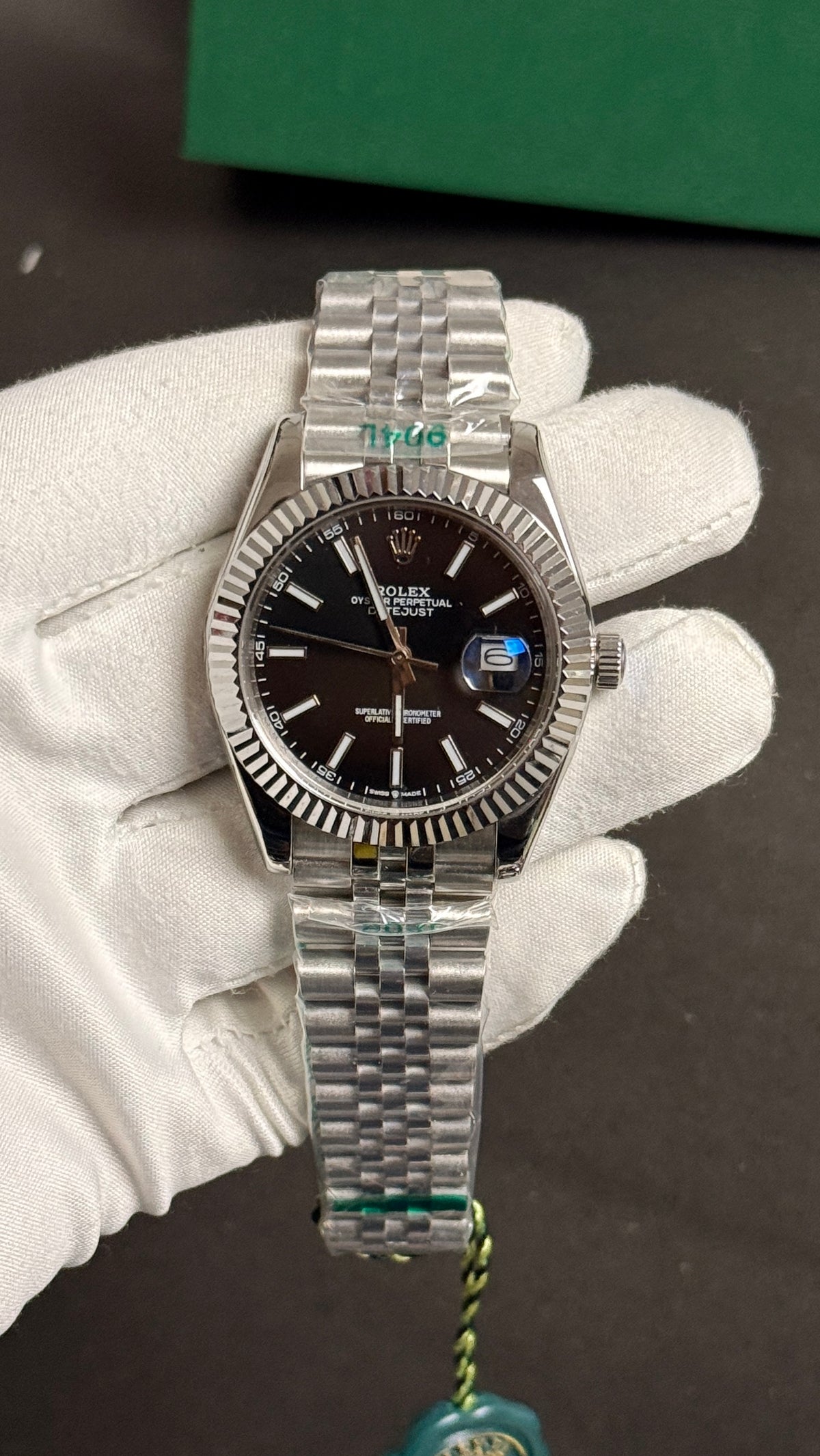 Silver with black Dial.