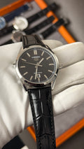 Silver with black Dial