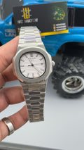 Silver with white Dial.