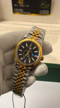 Yellow gold two tone with black Dial