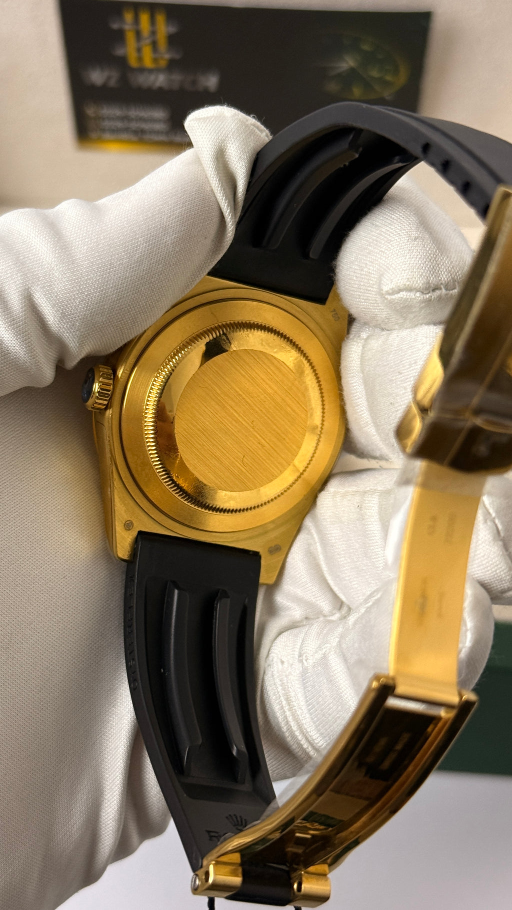 Yellow gold with black Dial.