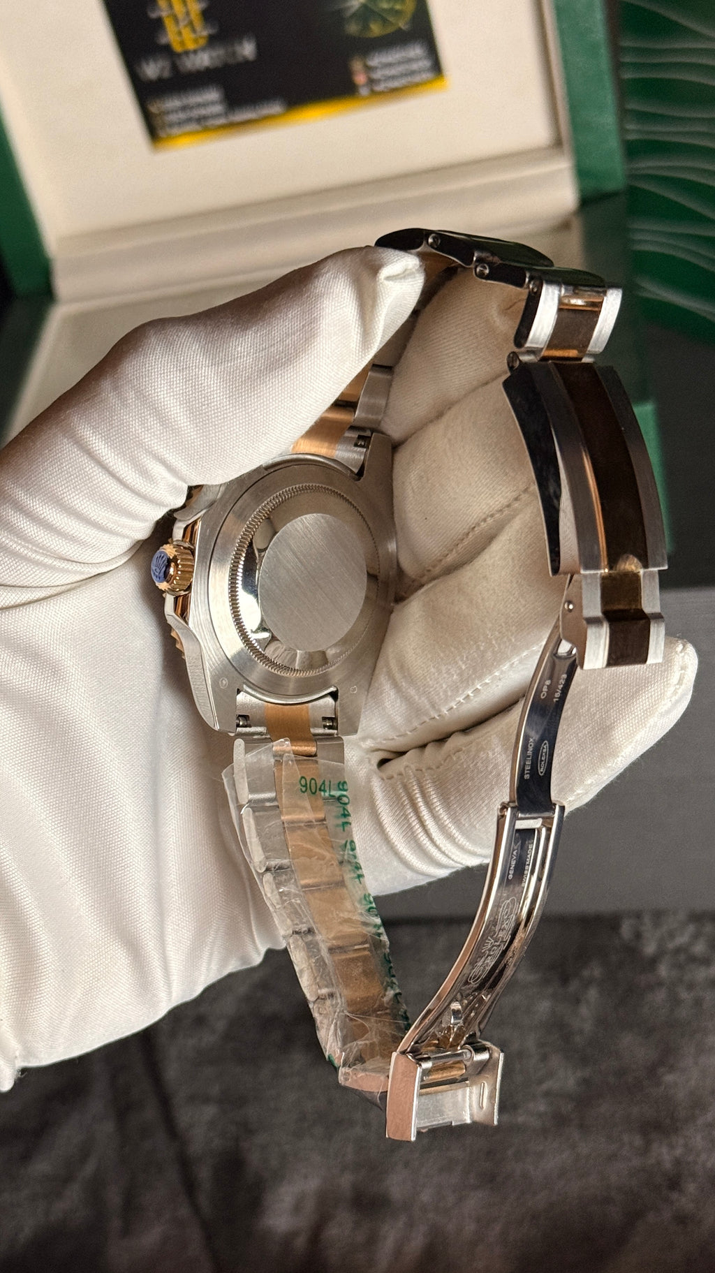 Rose gold two tone with  black Dial.