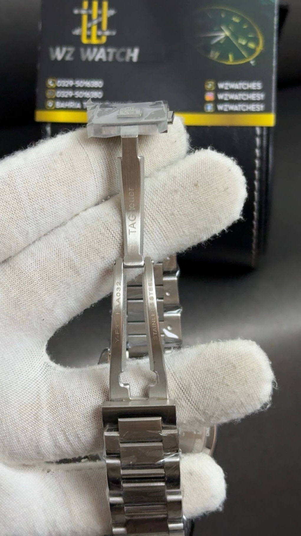 Silver with green Dial