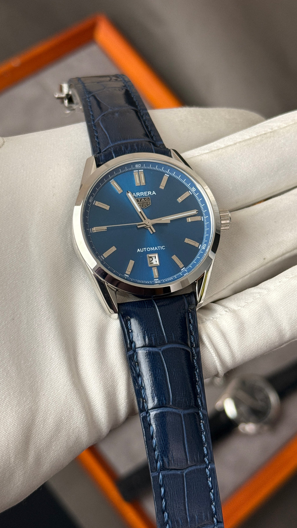 Silver with blue Dial