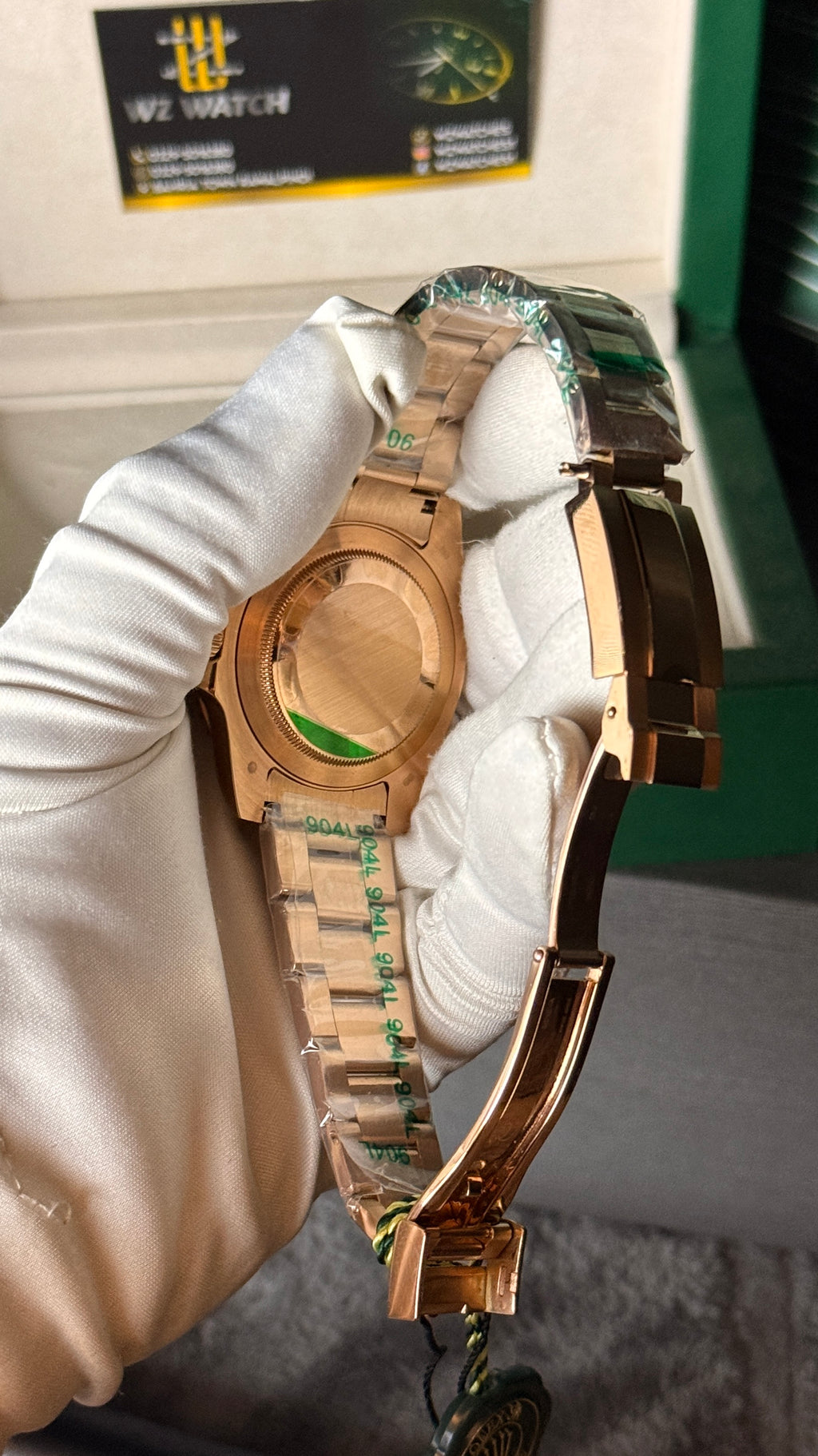 Rose gold with marble Dial.