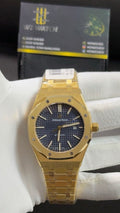 Yellow gold with blue dial