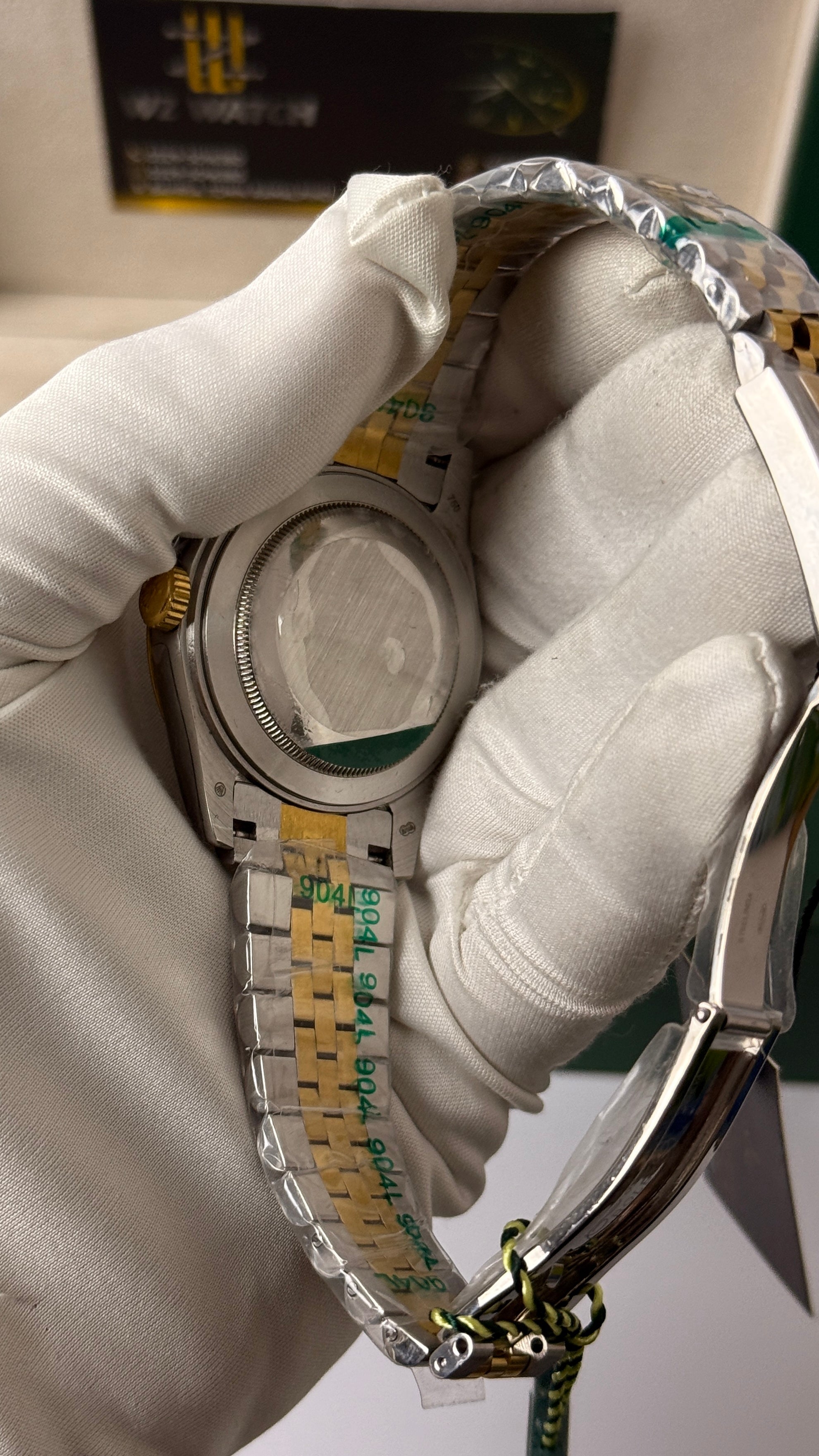 Yellow gold two tone with white Dial.