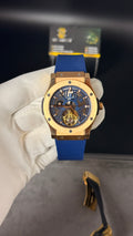 Rose gold with blue skeleton Dial